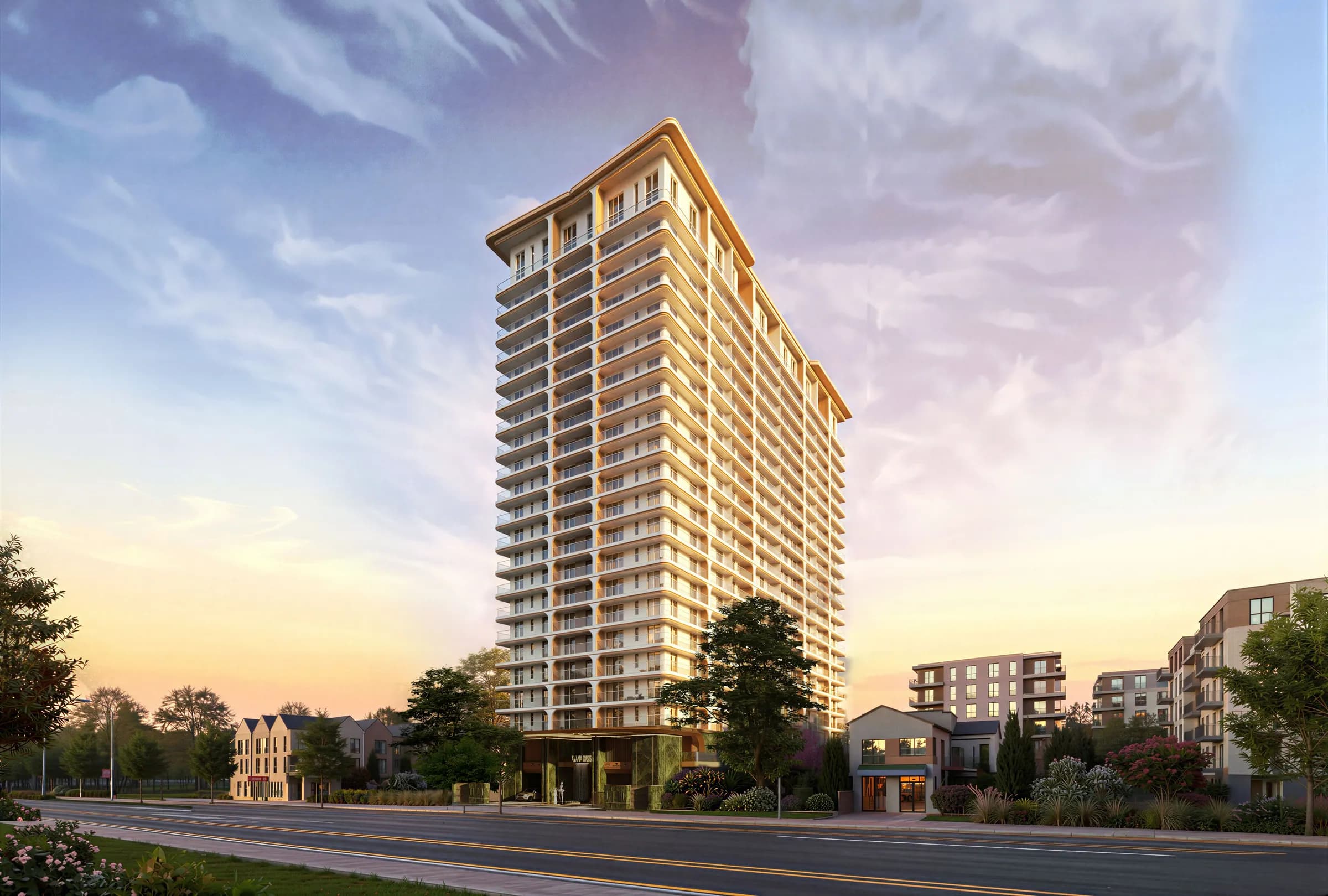 The Avana tower at dusk beside a road, the sky fading from blue to pink
