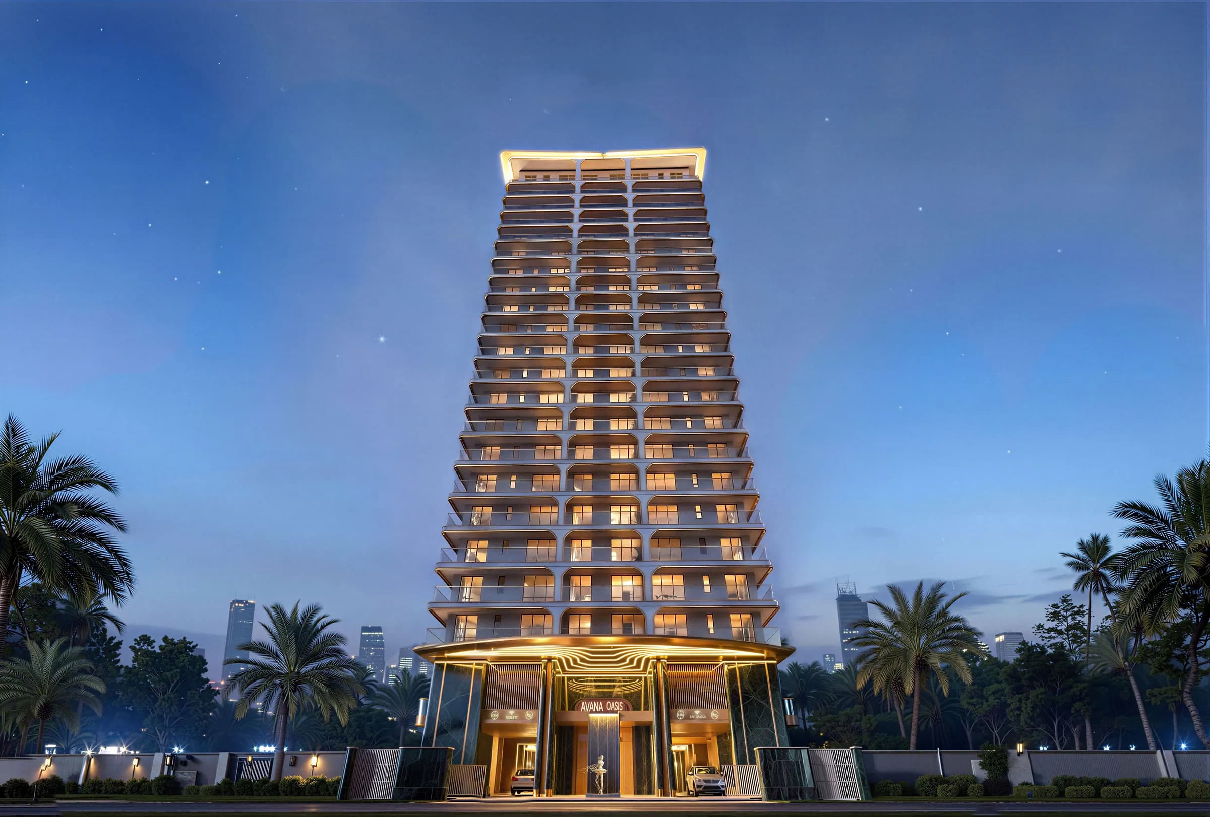 The Avana tower lit at night, with palm trees and the entrance glowing at its base