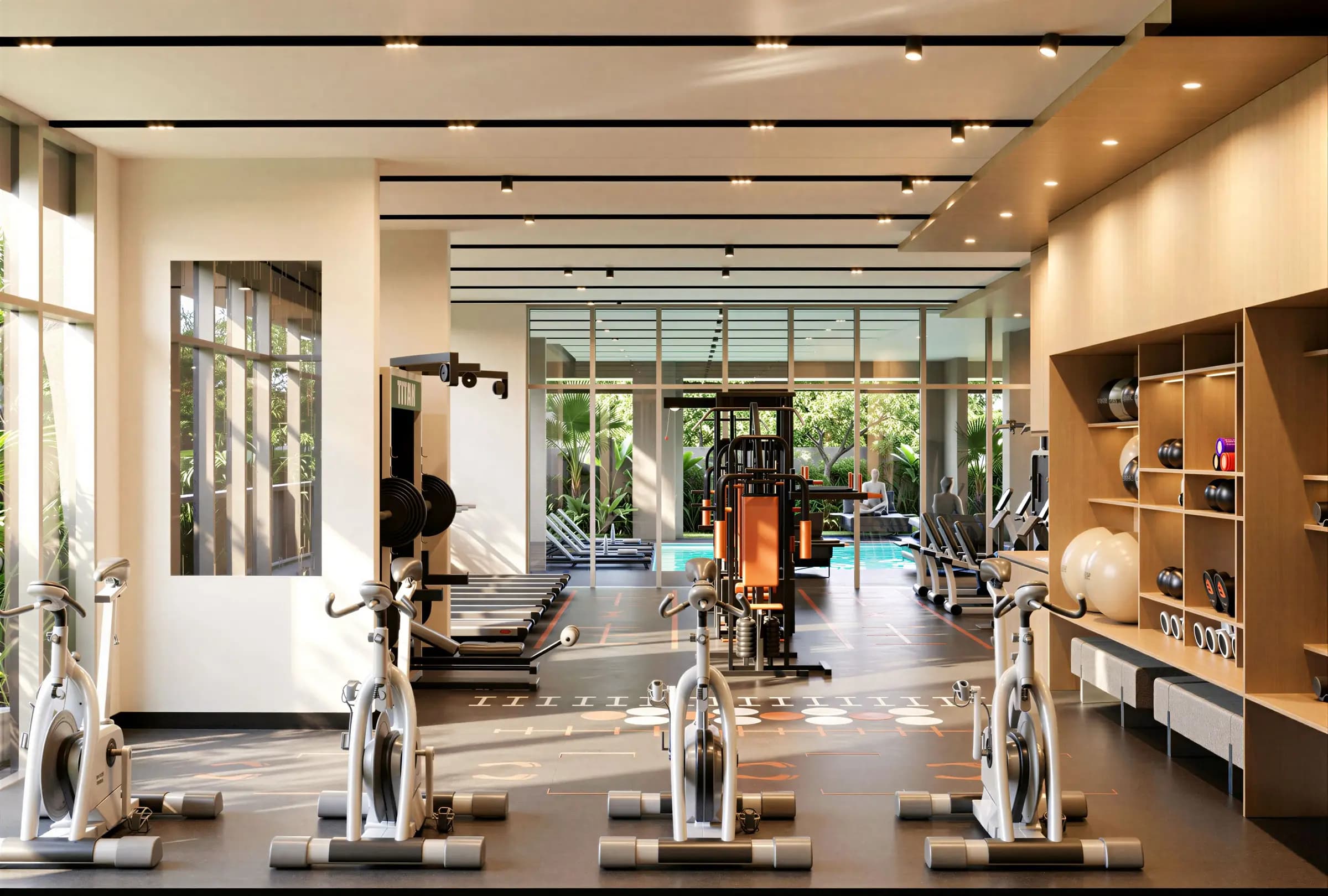 Sunlit Avana gym with exercise equipment and garden views